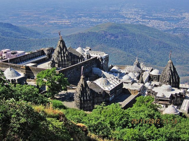 Jain_temples_on_Girnar_mountain_aerial_view.thumb.jpg.c4170be85daeddc141d7d52142610245.jpg